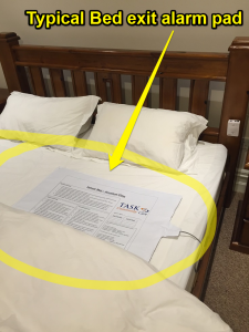 Bed exit alarm pad for falls